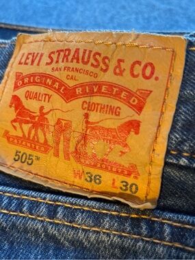 Levi's Men's Straight Jeans in Blue with Tan Leather Patch